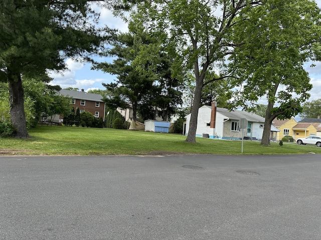 130 Judd Ave, New Britain, CT 06051 - view of front facade with a front lawn and a residential view