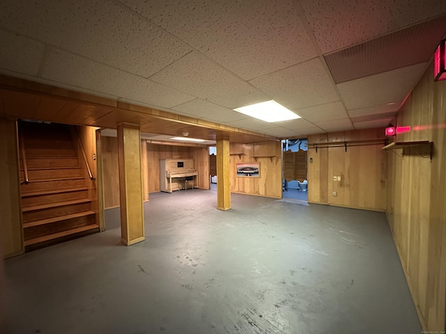 130 Judd Ave, New Britain, CT 06051 - finished basement with wood walls, stairway, and a drop ceiling
