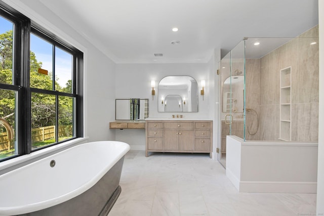 52 Garibaldi Ln, New Canaan, CT 06840 - bathroom featuring vanity, a shower stall, a freestanding tub, healthy amount of natural light, and recessed lighting