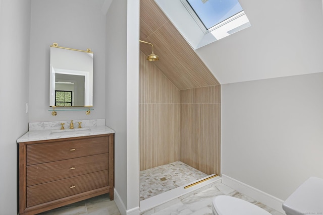 52 Garibaldi Ln, New Canaan, CT 06840 - full bathroom featuring marble look tiles, toilet, a skylight, a shower stall, and vaulted ceiling