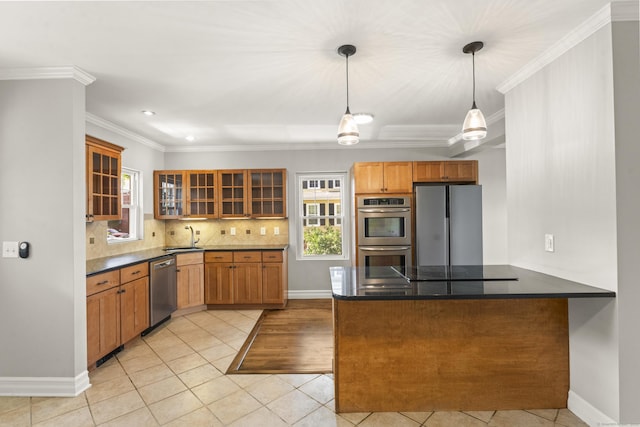 28 Chestnut St, Windsor Locks, CT 06096 - kitchen featuring stainless steel appliances, a peninsula, plenty of natural light, light tile patterned floors, and crown molding