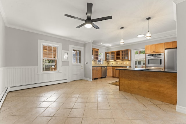28 Chestnut St, Windsor Locks, CT 06096 - kitchen with stainless steel appliances, dark countertops, ornamental molding, brown cabinets, and light tile patterned floors