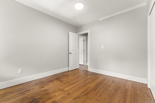 28 Chestnut St, Windsor Locks, CT 06096 - unfurnished room with baseboards, wood finished floors, and ornamental molding