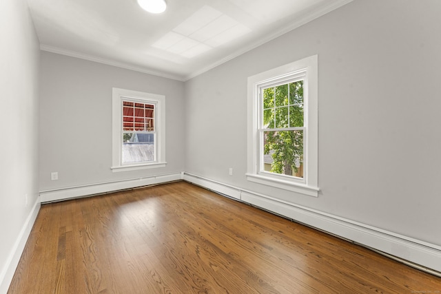 28 Chestnut St, Windsor Locks, CT 06096 - unfurnished room featuring a baseboard heating unit, crown molding, wood finished floors, and baseboards