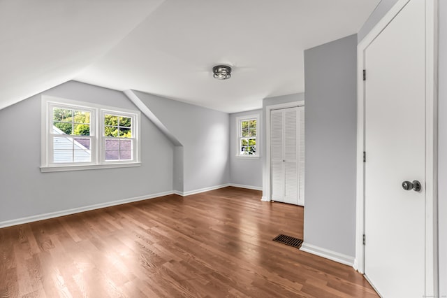226 Quinn St, Naugatuck, CT 06770 - bonus room featuring wood finished floors, plenty of natural light, lofted ceiling, and baseboards