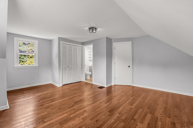 226 Quinn St, Naugatuck, CT 06770 - bonus room with wood finished floors, baseboards, and lofted ceiling