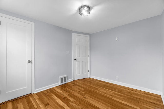 226 Quinn St, Naugatuck, CT 06770 - unfurnished bedroom with baseboards and light wood finished floors