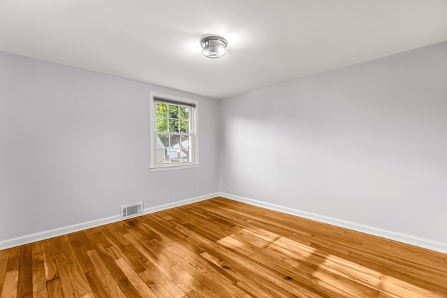 226 Quinn St, Naugatuck, CT 06770 - empty room featuring baseboards and wood-type flooring