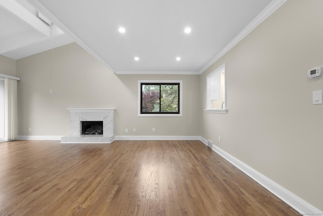 513 Opa Ln Unit B, Stratford, CT 06614 - unfurnished living room featuring wood finished floors, a high end fireplace, crown molding, baseboards, and recessed lighting