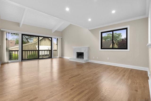 513 Opa Ln Unit B, Stratford, CT 06614 - unfurnished living room with wood finished floors, a fireplace, baseboards, recessed lighting, and crown molding
