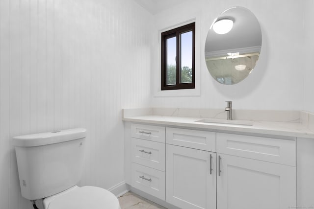 513 Opa Ln Unit B, Stratford, CT 06614 - bathroom with vanity, toilet, marble look tiles, and baseboards