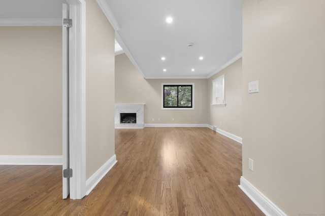 513 Opa Ln Unit B, Stratford, CT 06614 - unfurnished living room with crown molding, wood finished floors, baseboards, a high end fireplace, and recessed lighting
