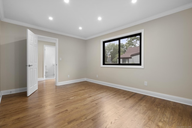 513 Opa Ln Unit B, Stratford, CT 06614 - empty room with baseboards, light wood-type flooring, crown molding, and recessed lighting