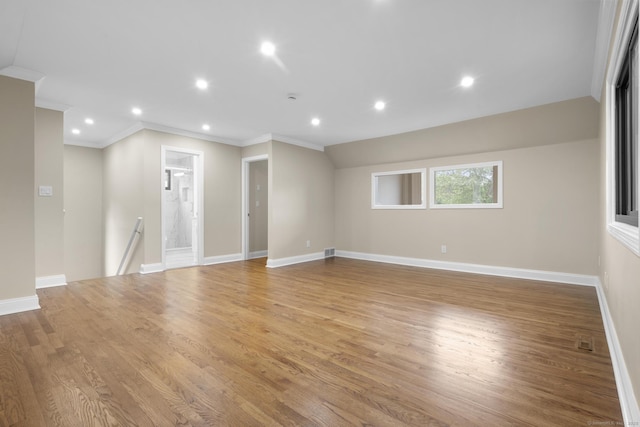 513 Opa Ln Unit B, Stratford, CT 06614 - empty room with ornamental molding, baseboards, light wood-type flooring, and recessed lighting
