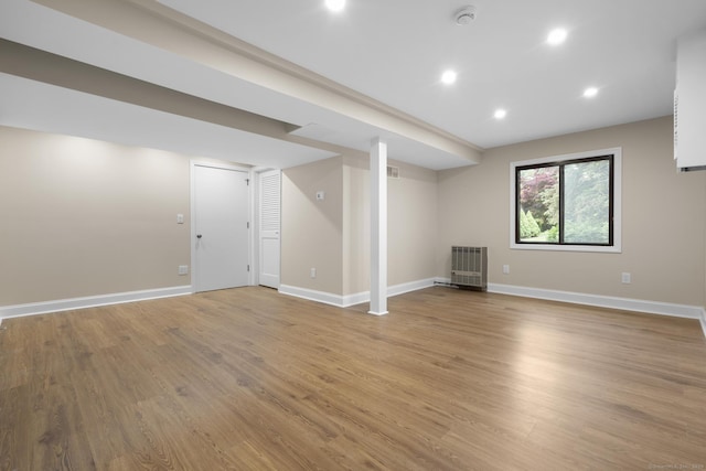 513 Opa Ln Unit B, Stratford, CT 06614 - below grade area with light wood finished floors, baseboards, and recessed lighting