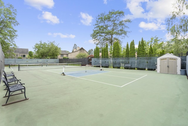 513 Opa Ln Unit B, Stratford, CT 06614 - view of tennis court with community basketball court and a storage unit