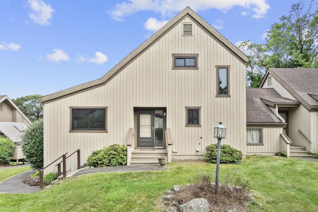 513 Opa Ln Unit B, Stratford, CT 06614 - view of front of property featuring roof with shingles, entry steps, and a front lawn
