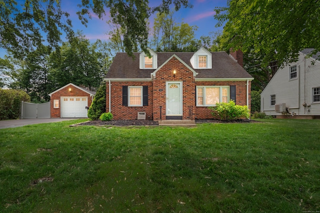 43 Superior Ave, Newington, CT 06111 - view of front of home with brick siding, asphalt driveway, an outdoor structure, a garage, and a lawn