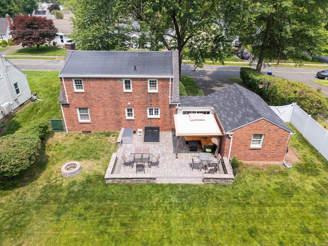 43 Superior Ave, Newington, CT 06111 - back of property featuring brick siding, an outdoor fire pit, and a patio