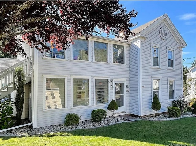 160 Main St, East Windsor, CT 06016 - view of front facade with a front lawn
