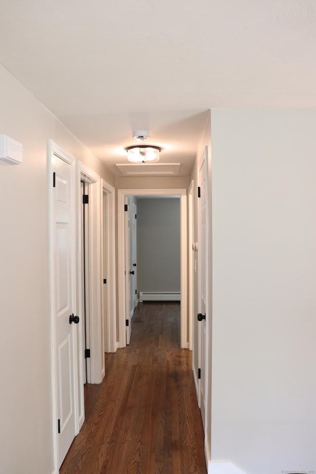 197 New Rd, Tolland, CT 06084 - hall with a baseboard radiator and dark wood-style flooring