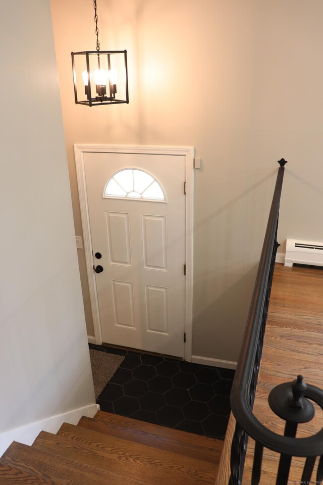 197 New Rd, Tolland, CT 06084 - tiled entrance foyer with a chandelier, baseboards, baseboard heating, and stairway