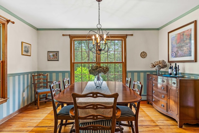 37 Sheffield Ln, Madison, CT 06443 - dining area featuring a chandelier, light wood-style flooring, wainscoting, crown molding, and wallpapered walls