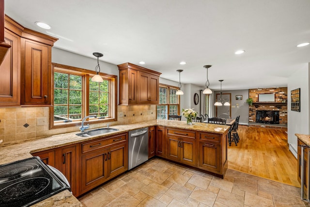 37 Sheffield Ln, Madison, CT 06443 - kitchen with dishwasher, black range with electric cooktop, brown cabinetry, and recessed lighting