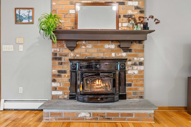 37 Sheffield Ln, Madison, CT 06443 - detailed view of baseboard heating and wood finished floors
