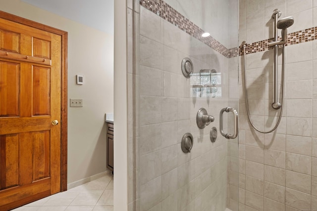 37 Sheffield Ln, Madison, CT 06443 - bathroom with tiled shower, vanity, and tile patterned flooring
