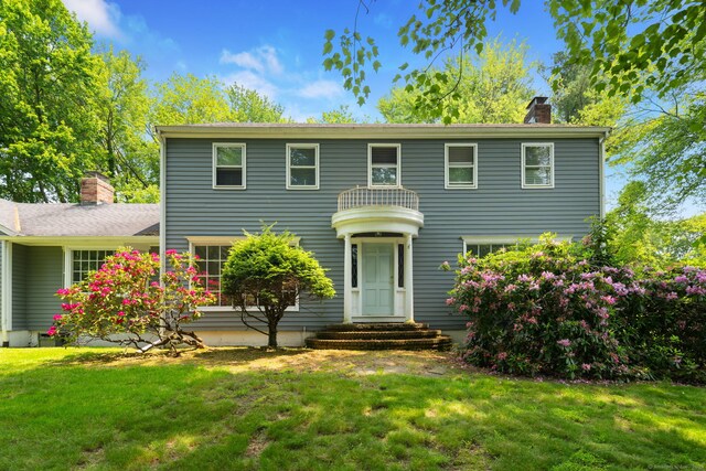 43 Hall Rd, Easton, CT 06612 - colonial home with a chimney and a front lawn