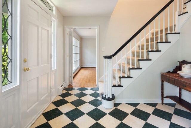 43 Hall Rd, Easton, CT 06612 - entryway with a baseboard radiator, stairway, and light flooring