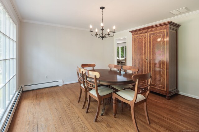 43 Hall Rd, Easton, CT 06612 - dining area featuring a baseboard radiator, a chandelier, light wood-type flooring, and crown molding