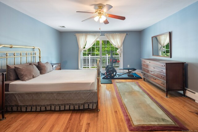 43 Hall Rd, Easton, CT 06612 - bedroom featuring wood finished floors, a ceiling fan, baseboard heating, and access to outside