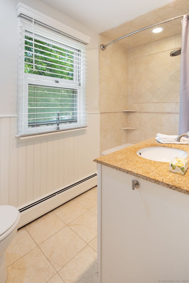 43 Hall Rd, Easton, CT 06612 - full bathroom with a baseboard heating unit, vanity, tile patterned floors, a shower with shower curtain, and wainscoting