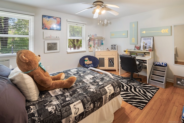 43 Hall Rd, Easton, CT 06612 - bedroom with hardwood / wood-style flooring, an office area, and a ceiling fan