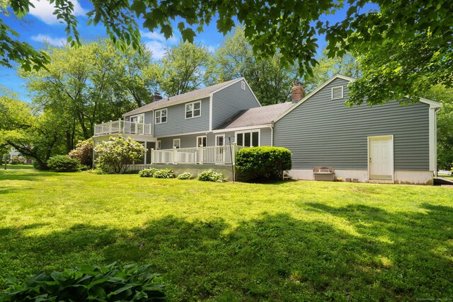 43 Hall Rd, Easton, CT 06612 - rear view of property featuring a chimney and a yard