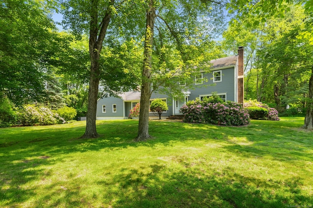 43 Hall Rd, Easton, CT 06612 - view of front of house featuring a chimney and a front lawn