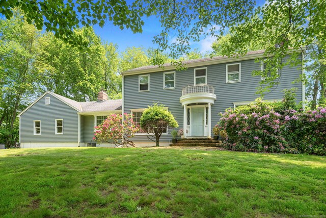 43 Hall Rd, Easton, CT 06612 - colonial house with a front lawn and a chimney