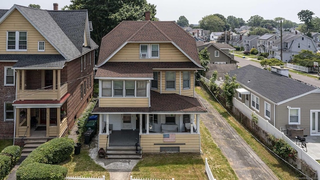 3800 Main St, Stratford, CT 06614 - view of front of home with a porch, a residential view, a shingled roof, and driveway