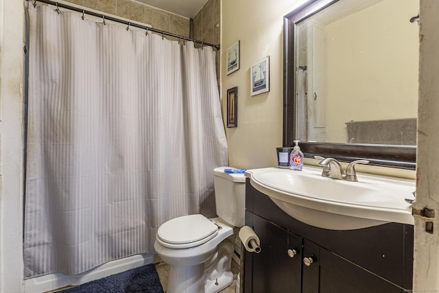 3800 Main St, Stratford, CT 06614 - bathroom with toilet, vanity, and a shower with shower curtain