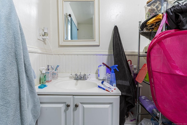 3800 Main St, Stratford, CT 06614 - bathroom featuring vanity and a wainscoted wall