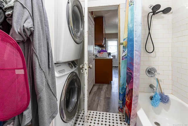 3800 Main St, Stratford, CT 06614 - washroom featuring estacked washer and dryer and wood finished floors