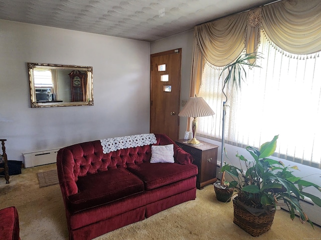 82 Hotchkiss St, Waterbury, CT 06704 - living room with a baseboard radiator and carpet flooring