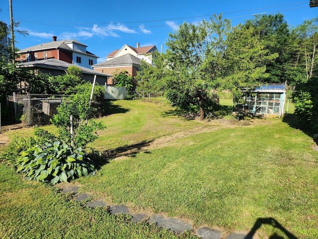 82 Hotchkiss St, Waterbury, CT 06704 - view of yard featuring an outdoor structure and a greenhouse