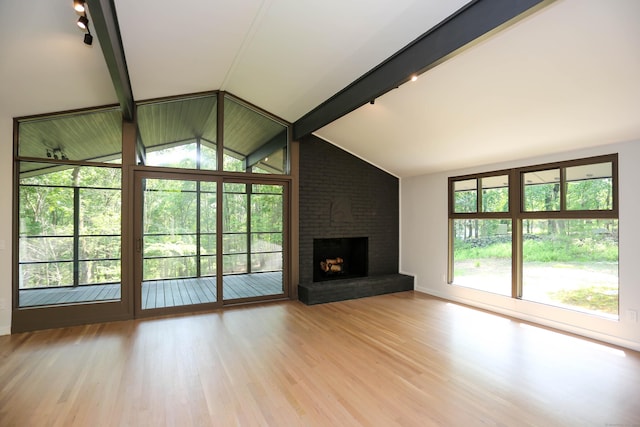 7 Hillcrest Ln, Weston, CT 06883 - unfurnished living room with a brick fireplace and wood finished floors