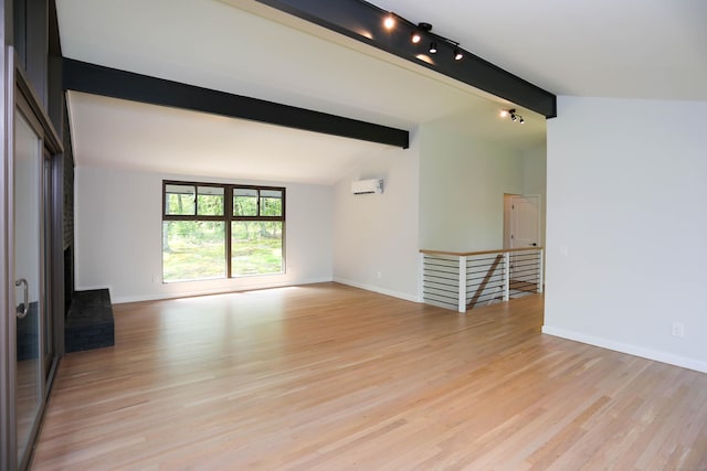 7 Hillcrest Ln, Weston, CT 06883 - unfurnished living room with light wood finished floors, a wall mounted air conditioner, and rail lighting