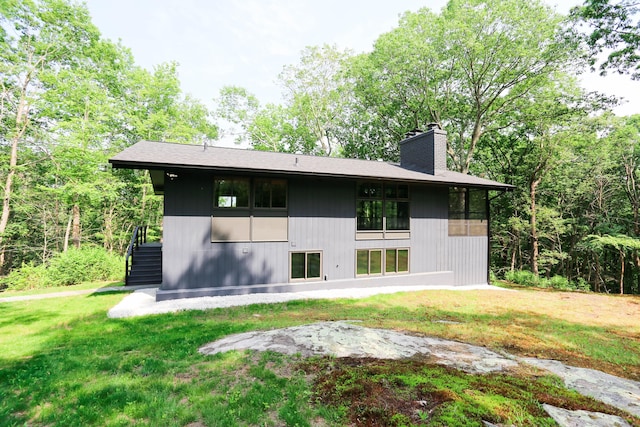 7 Hillcrest Ln, Weston, CT 06883 - back of house with a chimney and a yard