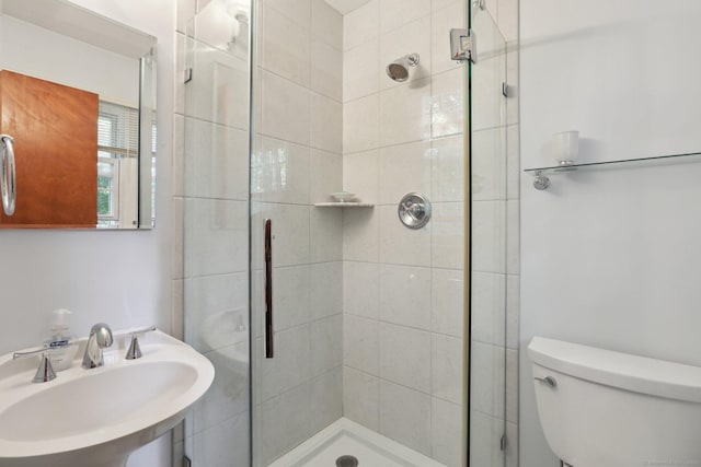 26 Wayfaring Rd, Norwalk, CT 06851 - bathroom with a sink, a shower stall, and toilet