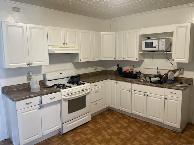50 Beacon St, Waterbury, CT 06704 - kitchen featuring white appliances, under cabinet range hood, crown molding, and white cabinetry